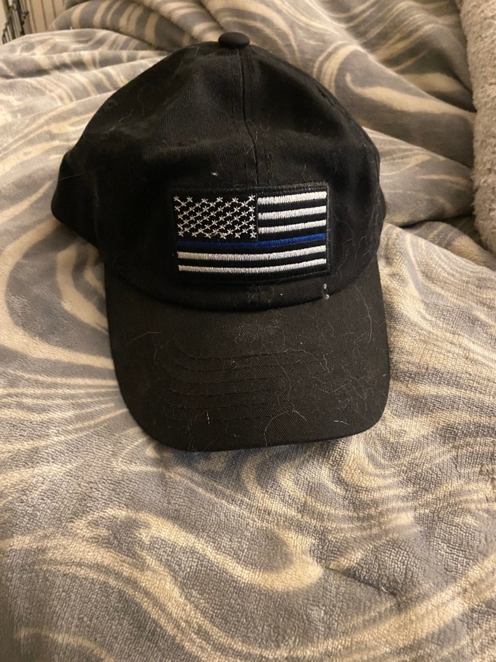 American flag blue line hat.